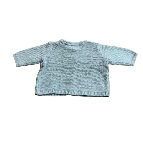 Saco para bebé tejido color claro y cierre frontal